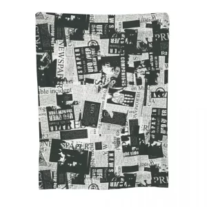 Couverture motif vieux journaux en polaire